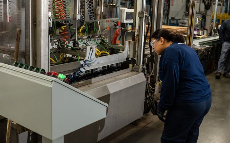 Lead battery manufacturing employee working on the production line that supports a successful circular economy.